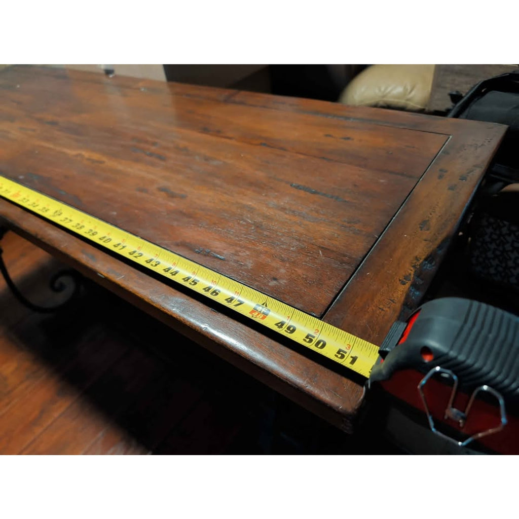 Designer centerpiece table. Wood grain. Steel supports. Extremely sturdy