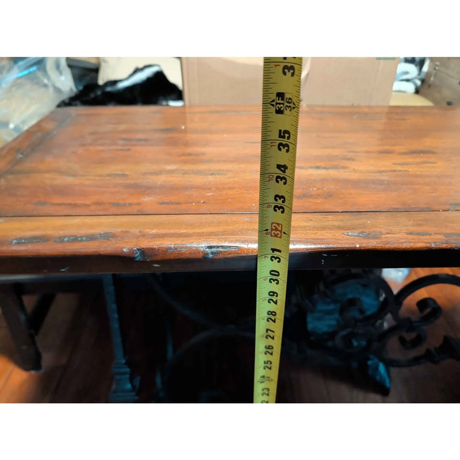 Designer centerpiece table. Wood grain. Steel supports. Extremely sturdy
