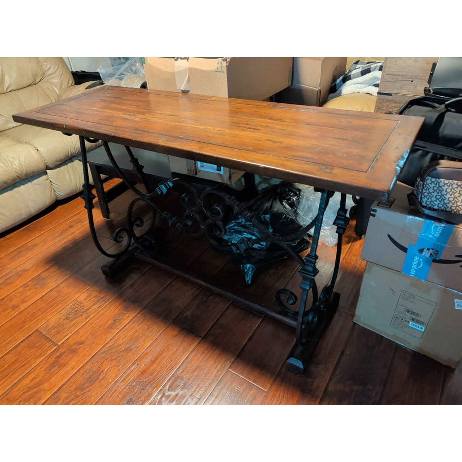Designer centerpiece table. Wood grain. Steel supports. Extremely sturdy