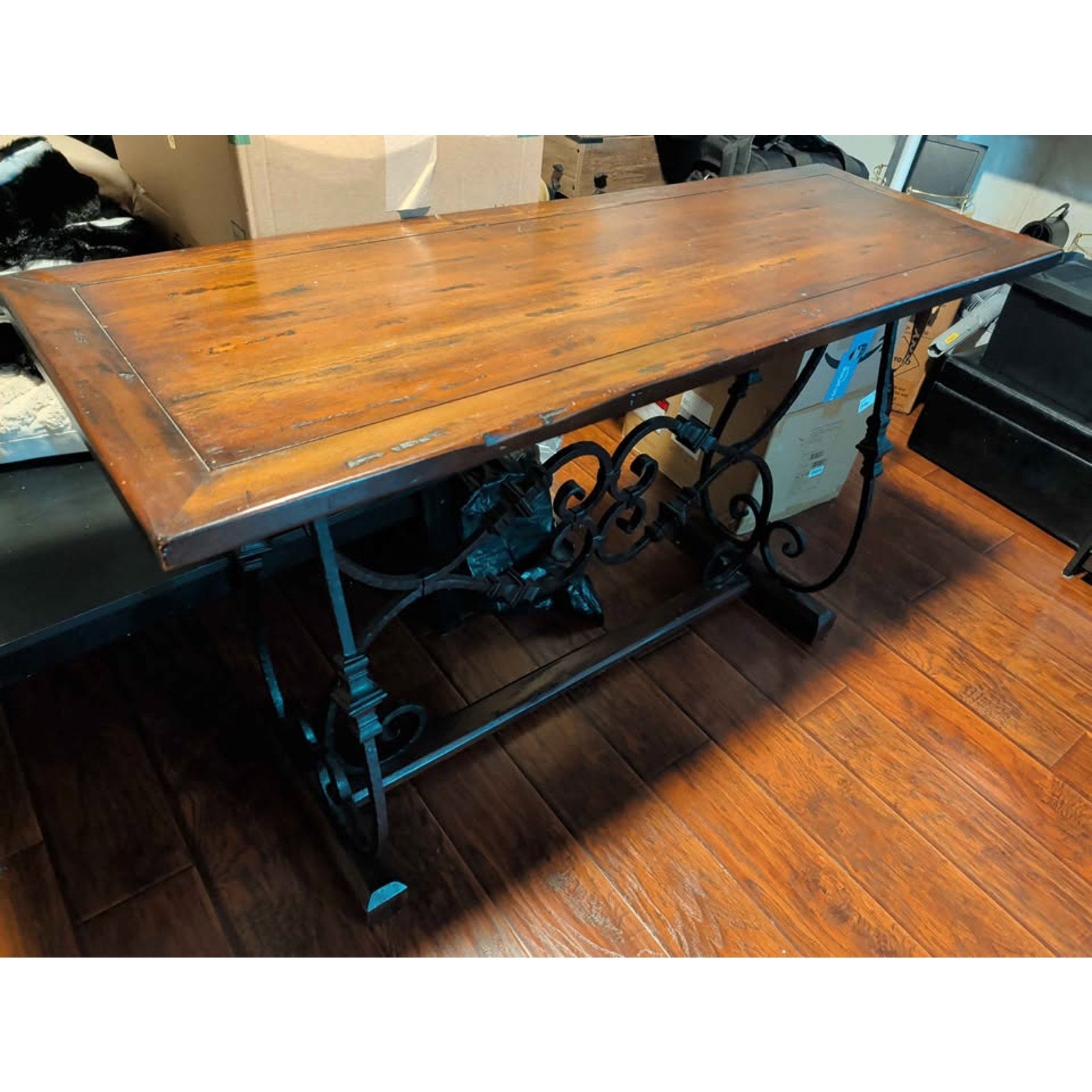 Designer centerpiece table. Wood grain. Steel supports. Extremely sturdy